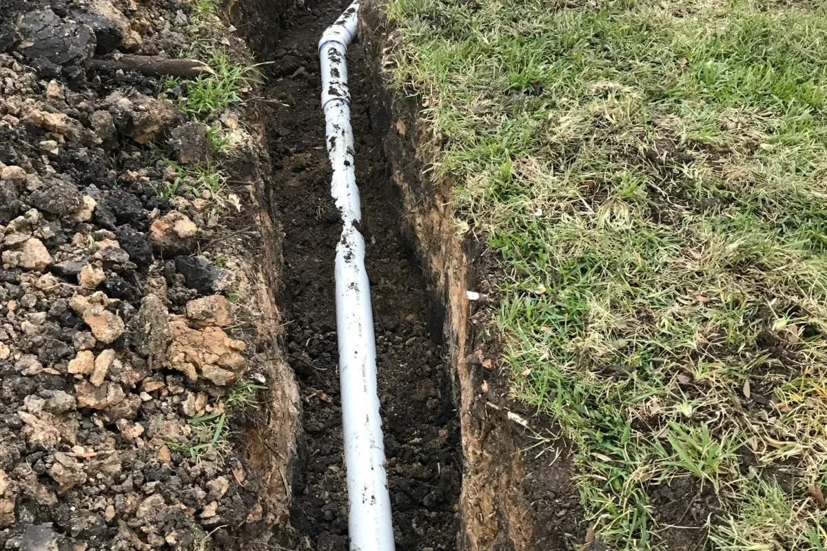 digging trench for sewer line in 2026