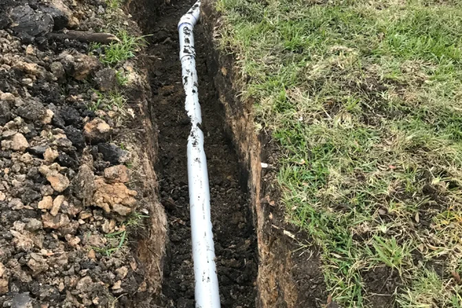 digging trench for sewer line in 2026